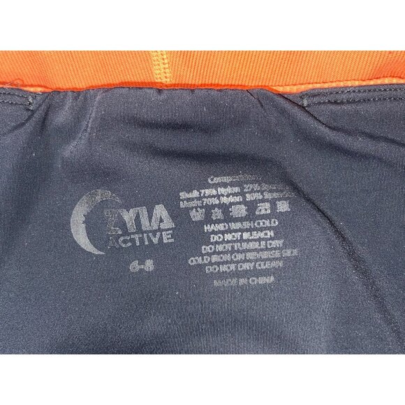 Orange Athletic Leggings With Black Stripes & Crescent Logo - Picture 4 of 4